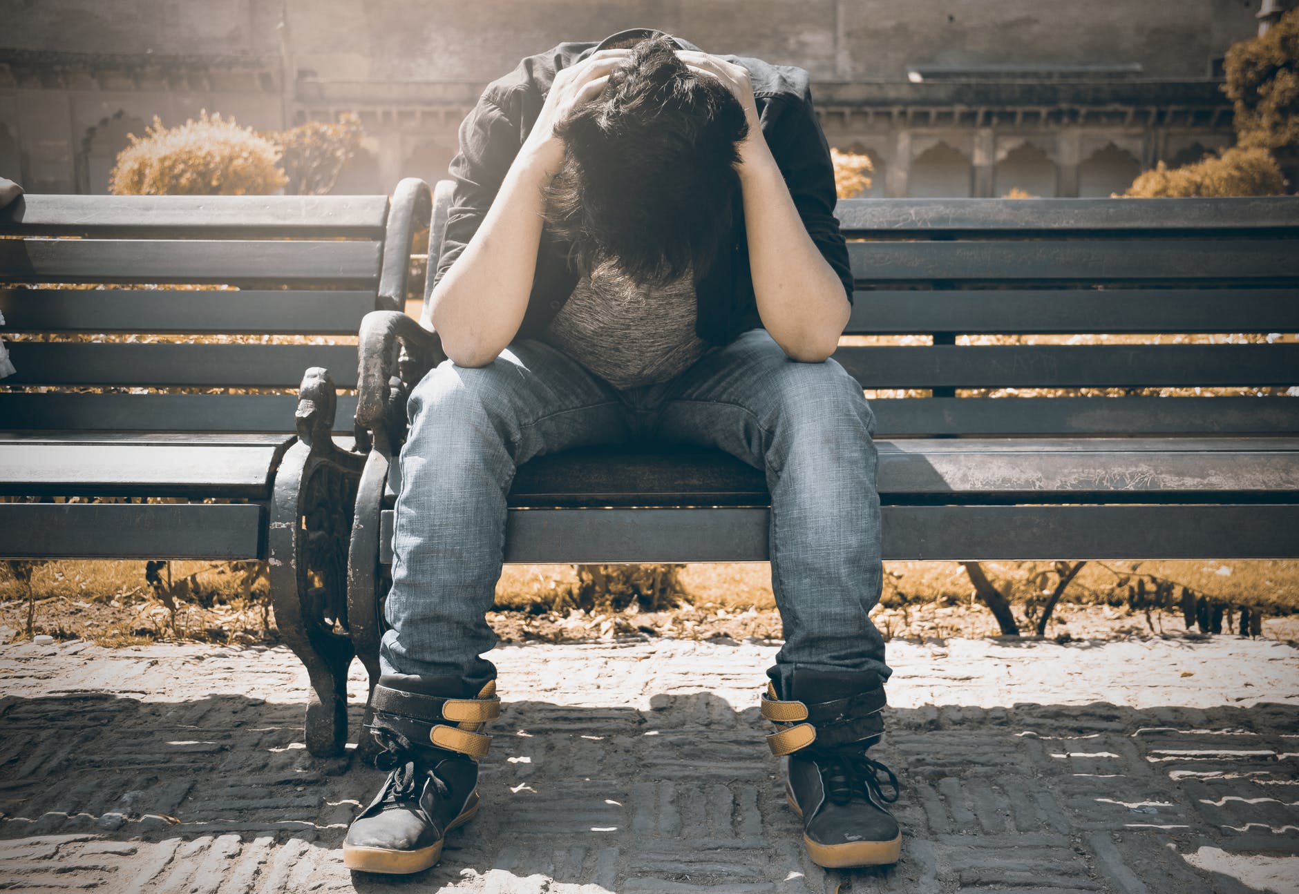 Stressed out man on bench